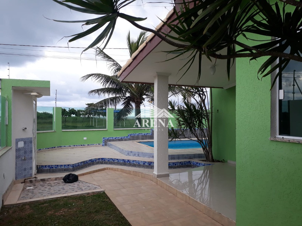 CASA NOVA  EM FRENTE AO MAR.. (TERRENO DE ESQUINA).  COM 4 dormitórios ( 4 suítes), ampla sala e coz